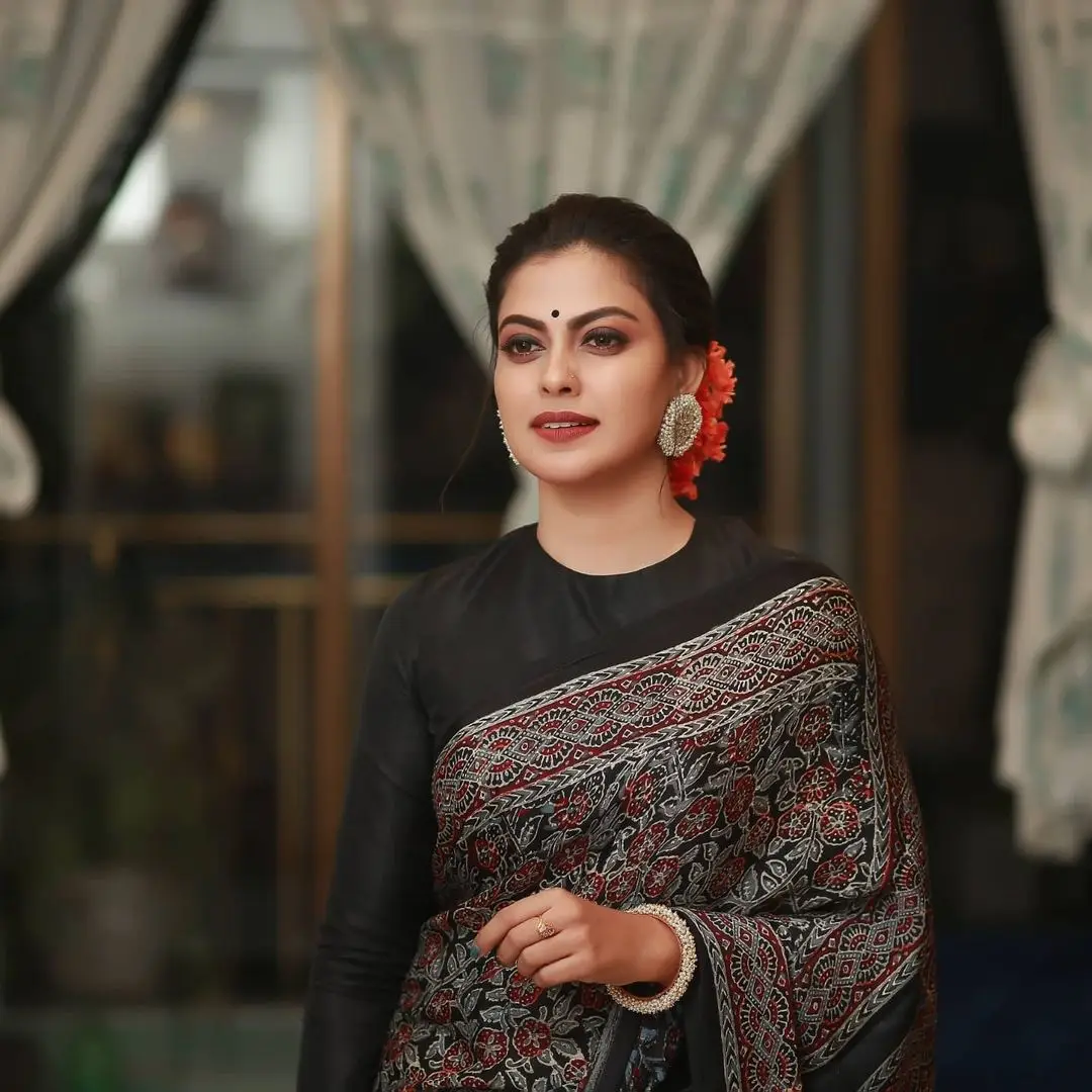 Anusree Nair Wearing Beautiful Earrings Jewellery Black Saree Blouse